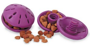 round, purple, treat-dispensing dog toy