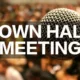 blurry image of crowd with mircrophone in foreground and text "Town Hall Meeting"