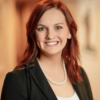 photo of a woman smiling at the camera